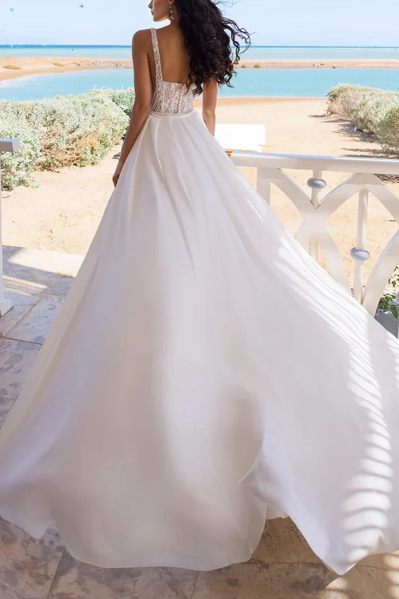 A unique square lace top with side slits and bohemian style wedding dress