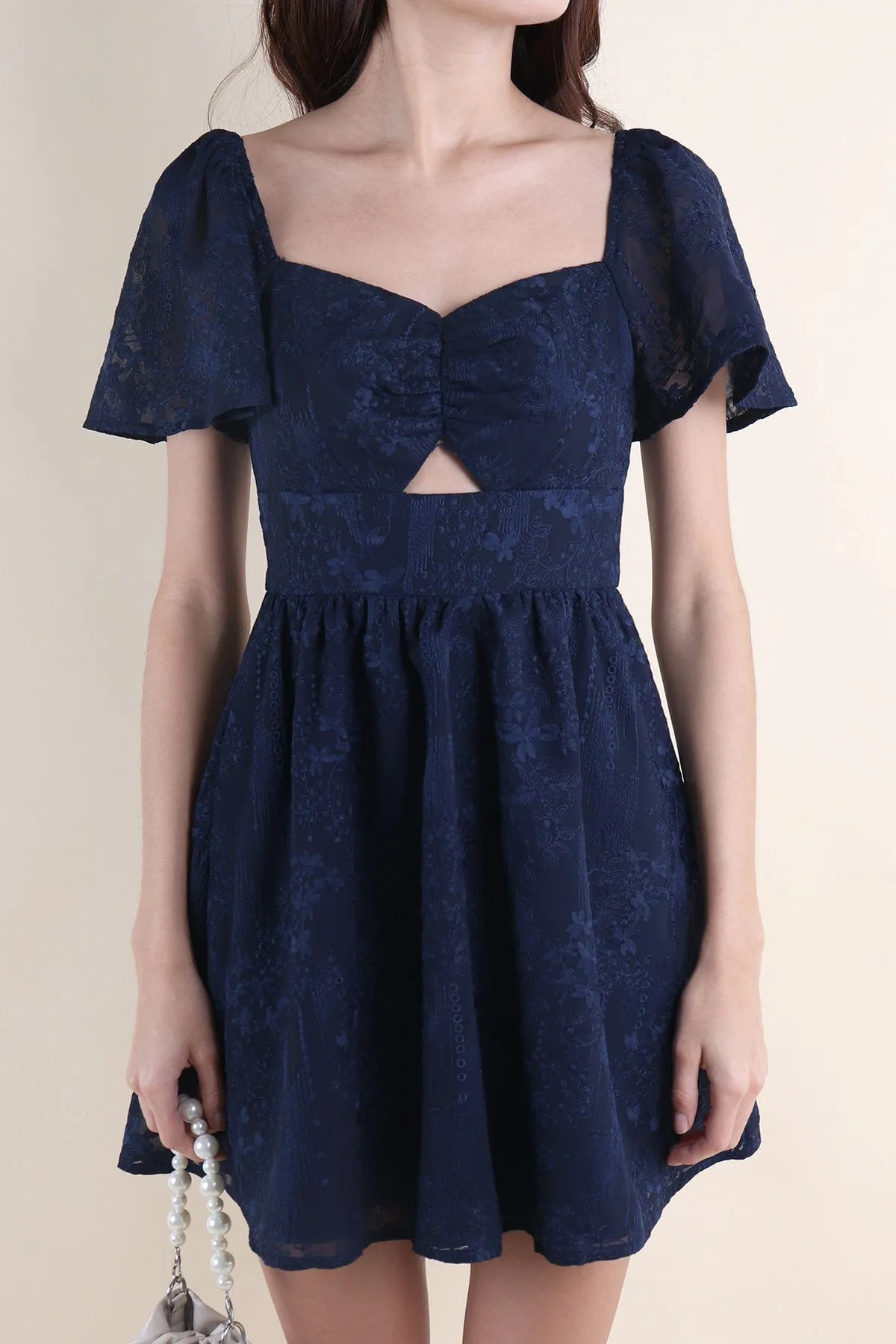 FIDELIA FLUTTERS CUT-OUT DRESS IN NAVY