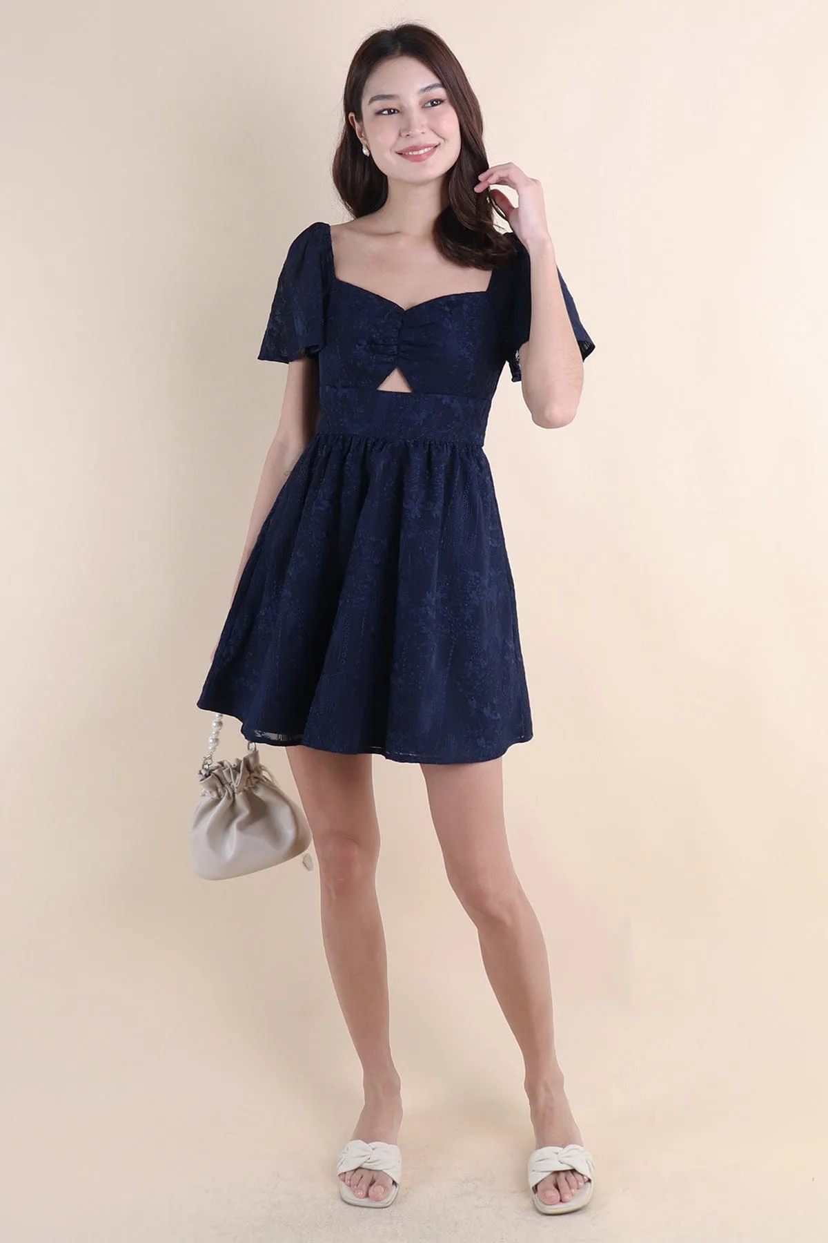 FIDELIA FLUTTERS CUT-OUT DRESS IN NAVY